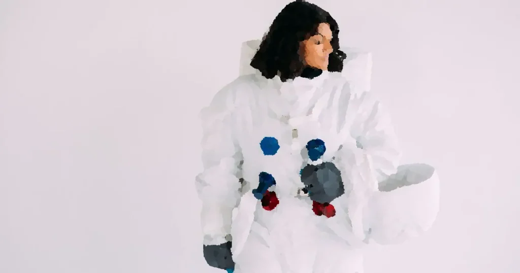 Woman in a white astronaut suit against a plain background.