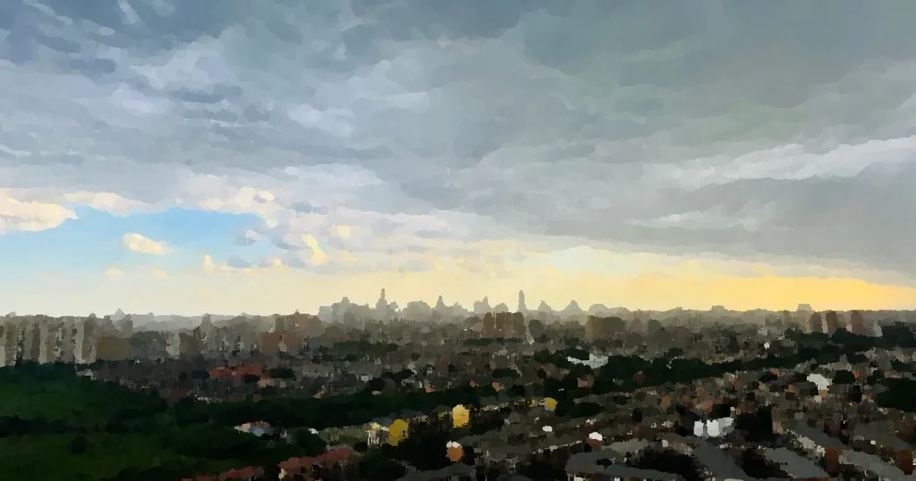 Stunning aerial view of Tianjin's cityscape with dramatic skies at sunset, showcasing modern architecture and expansive urban layout.