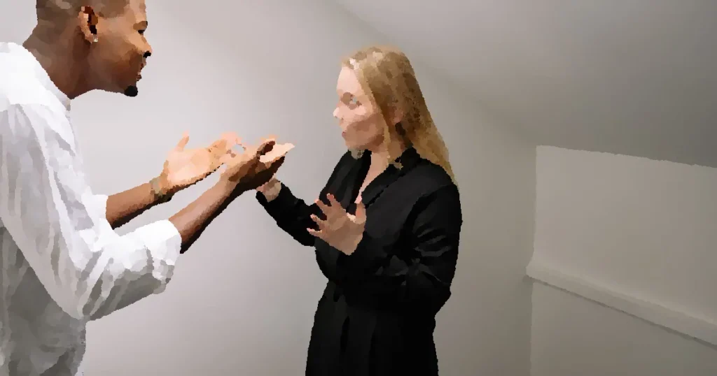 A man and woman having a heated discussion in a minimalistic indoor space.