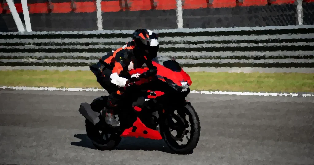 A motorcyclist in racing gear speeds on a track in Sepang, Malaysia.