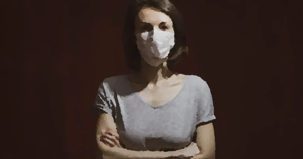 Studio portrait of a woman wearing a face mask. Concept of health, pandemic, and protection.